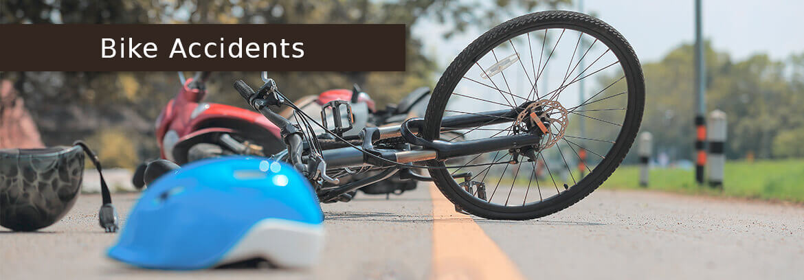 Bike Accidents Personal Injury Cases - Law Offices of Brian Larsen bike crash with helmet on ground with caption Bike Accidents