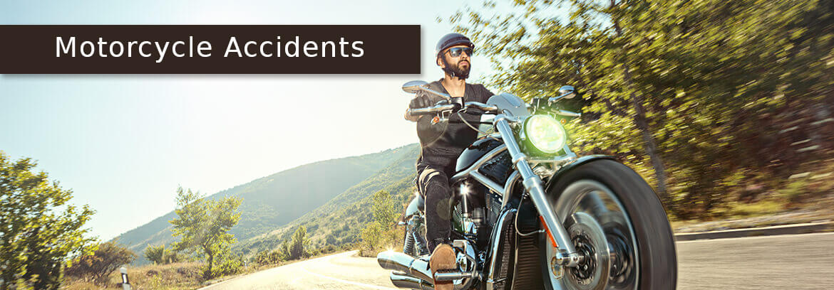 Motorcycle Accidents - Law Offices of Brian Larsen motorcyclist on the road with caption Motorcycle Accidents